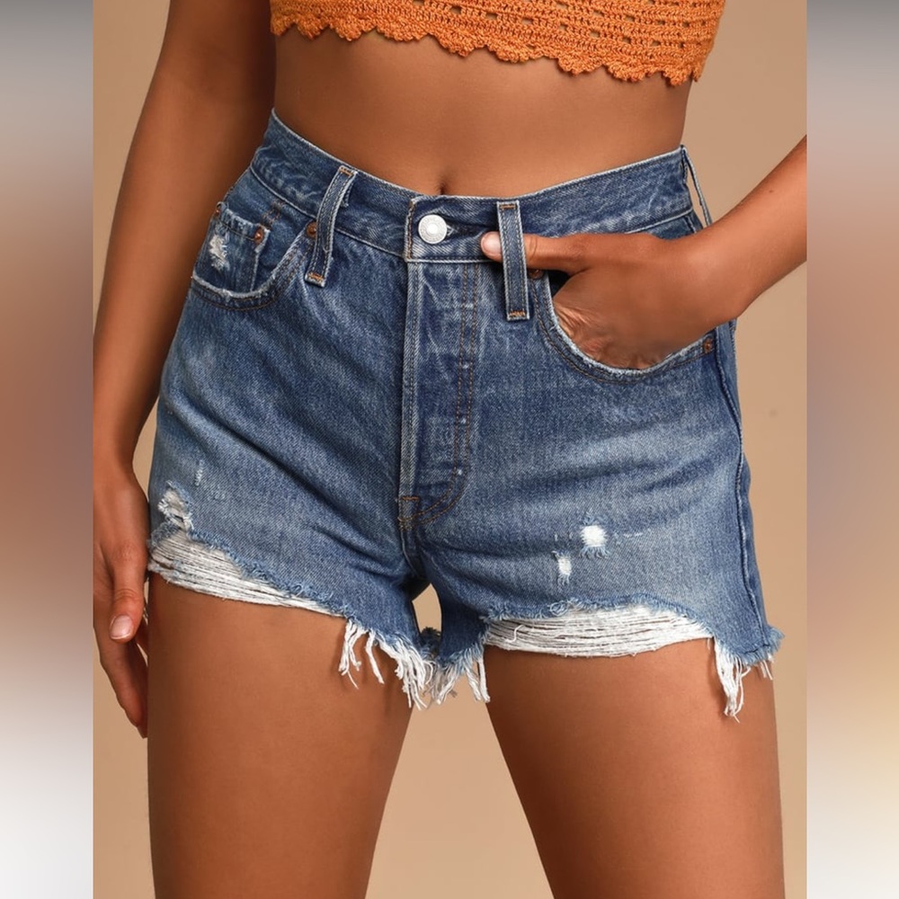 Levi’s 501 mid riser medium wash denim cutoff shorts